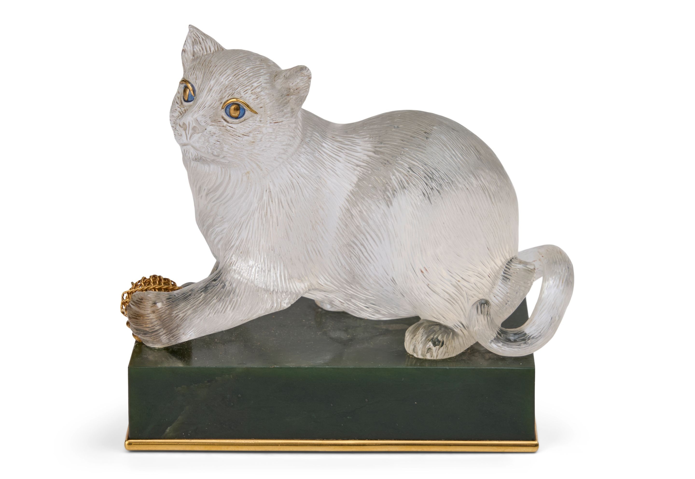 Boucheron cat carved in rock crystal with gold claws and its own gold ball of yarn, on a green nephrite base — lot 65, a cat that sits on a shelf rather than on a person