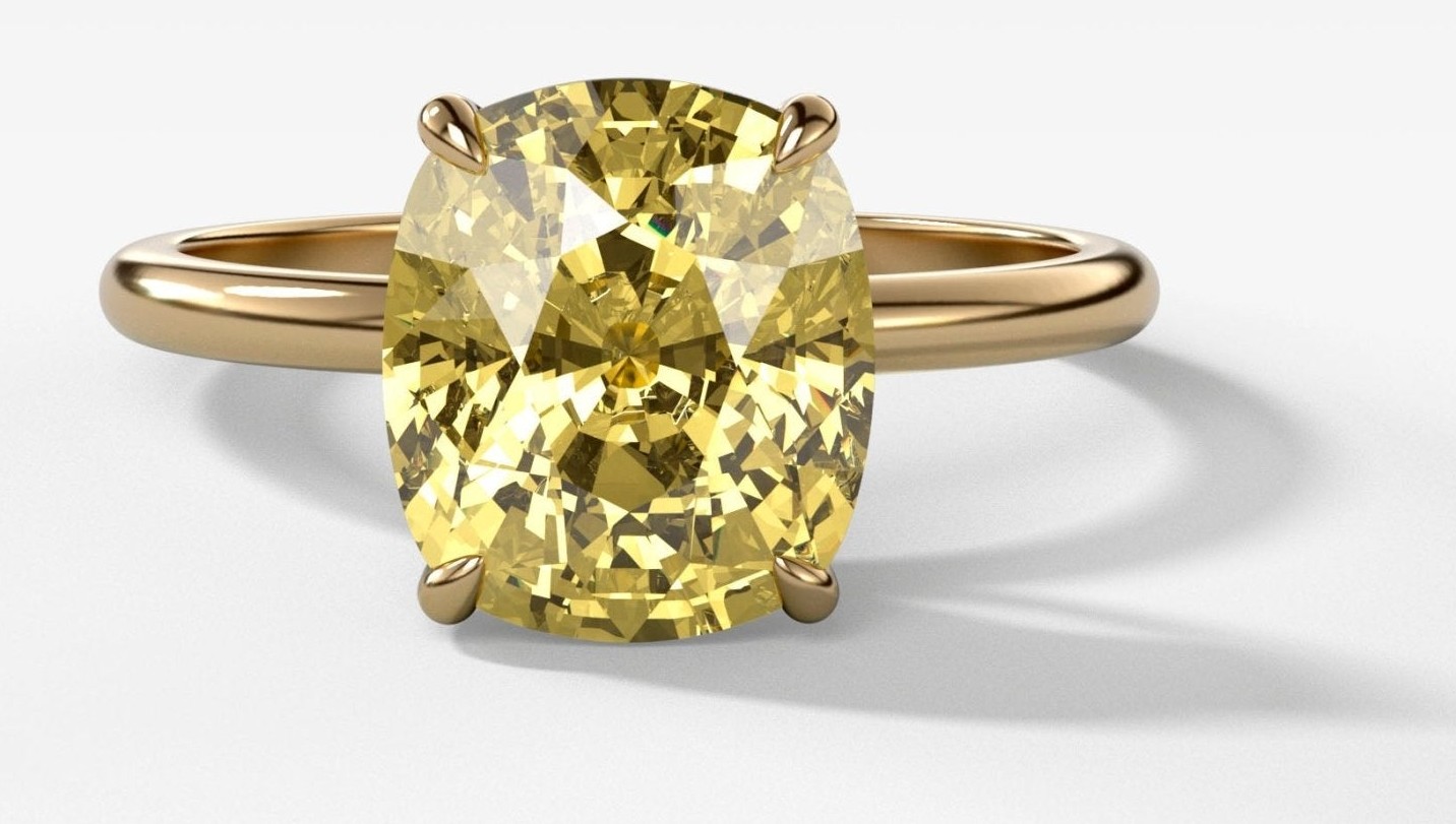 Thin + Simple canary-yellow elongated cushion solitaire by GOODSTONE