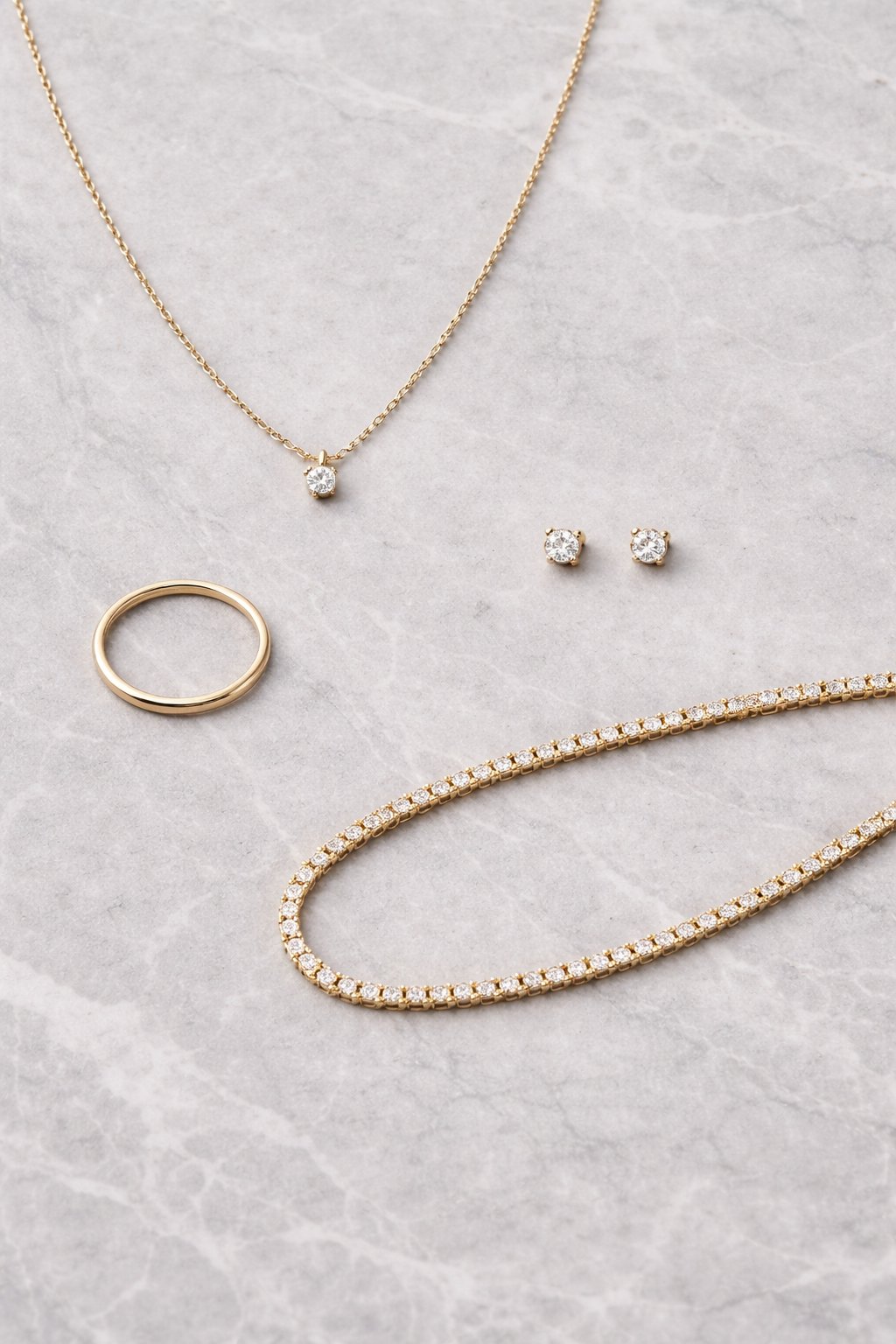 Thin chain, solitaire pendant, plain band, diamond studs, tennis necklace — the interchangeable basics of every brand's quiet luxury pitch