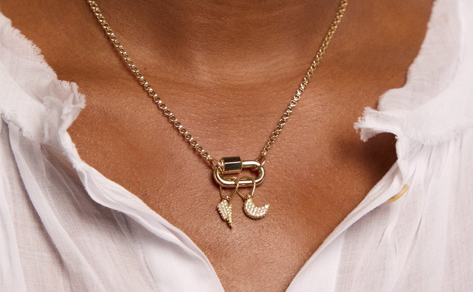Gold Babylock clasp worn on wrist, by Marla Aaron