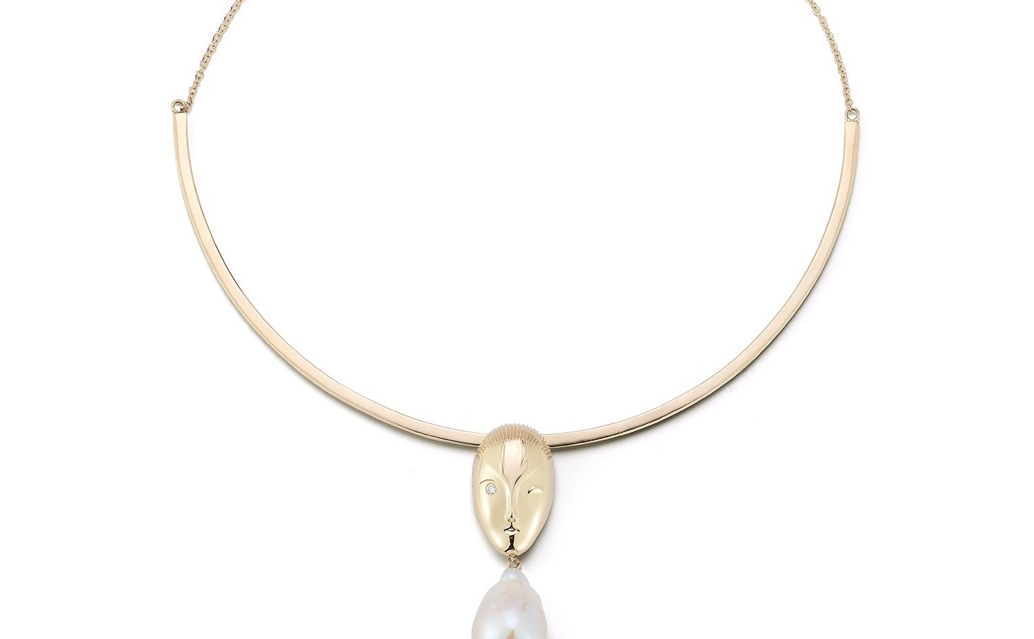 Baroque pearl pendant and brown diamond ring, both set in textured yellow gold. Organic, irregular, characterful.