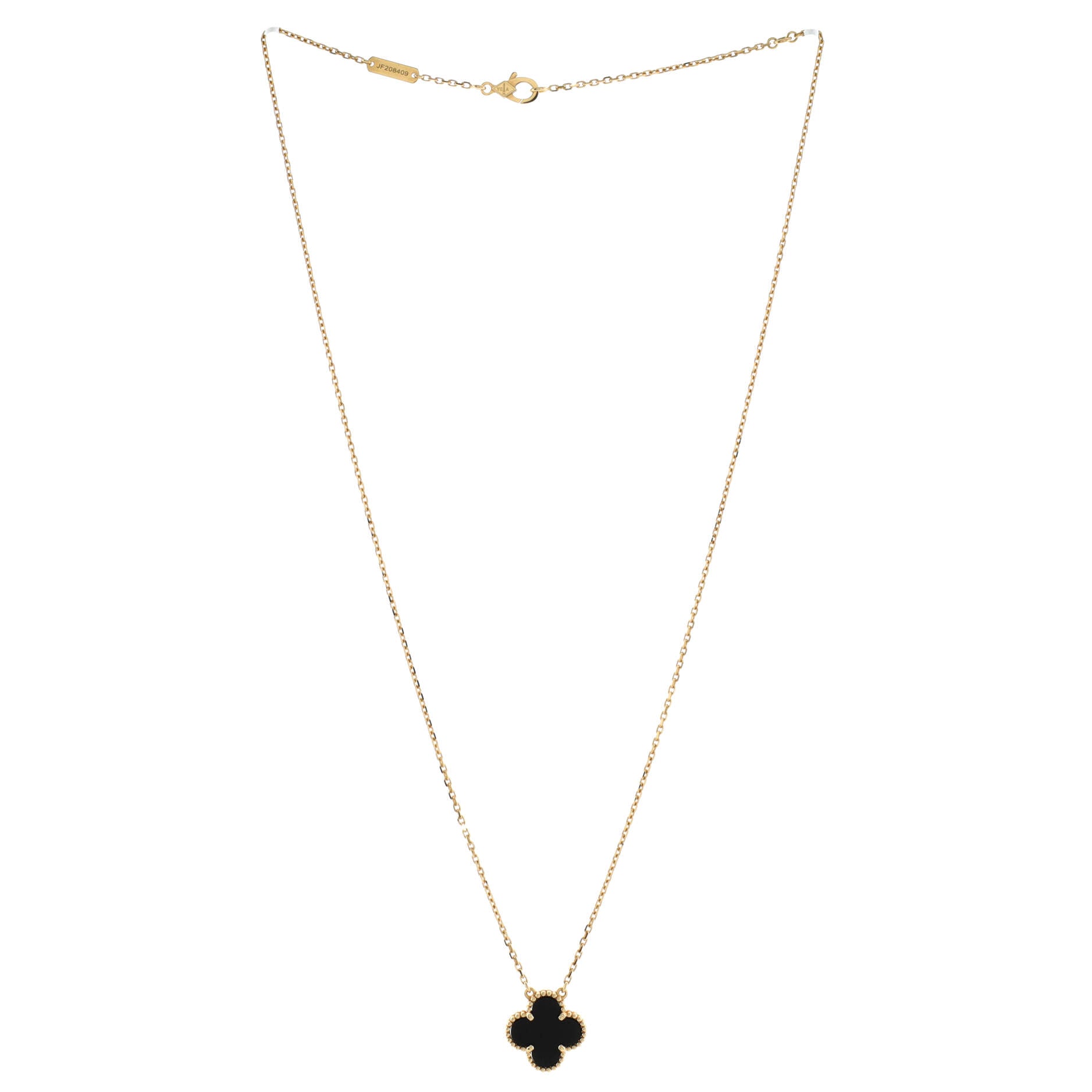 Van Cleef & Arpels Vintage Alhambra pendant in 18K yellow gold and onyx