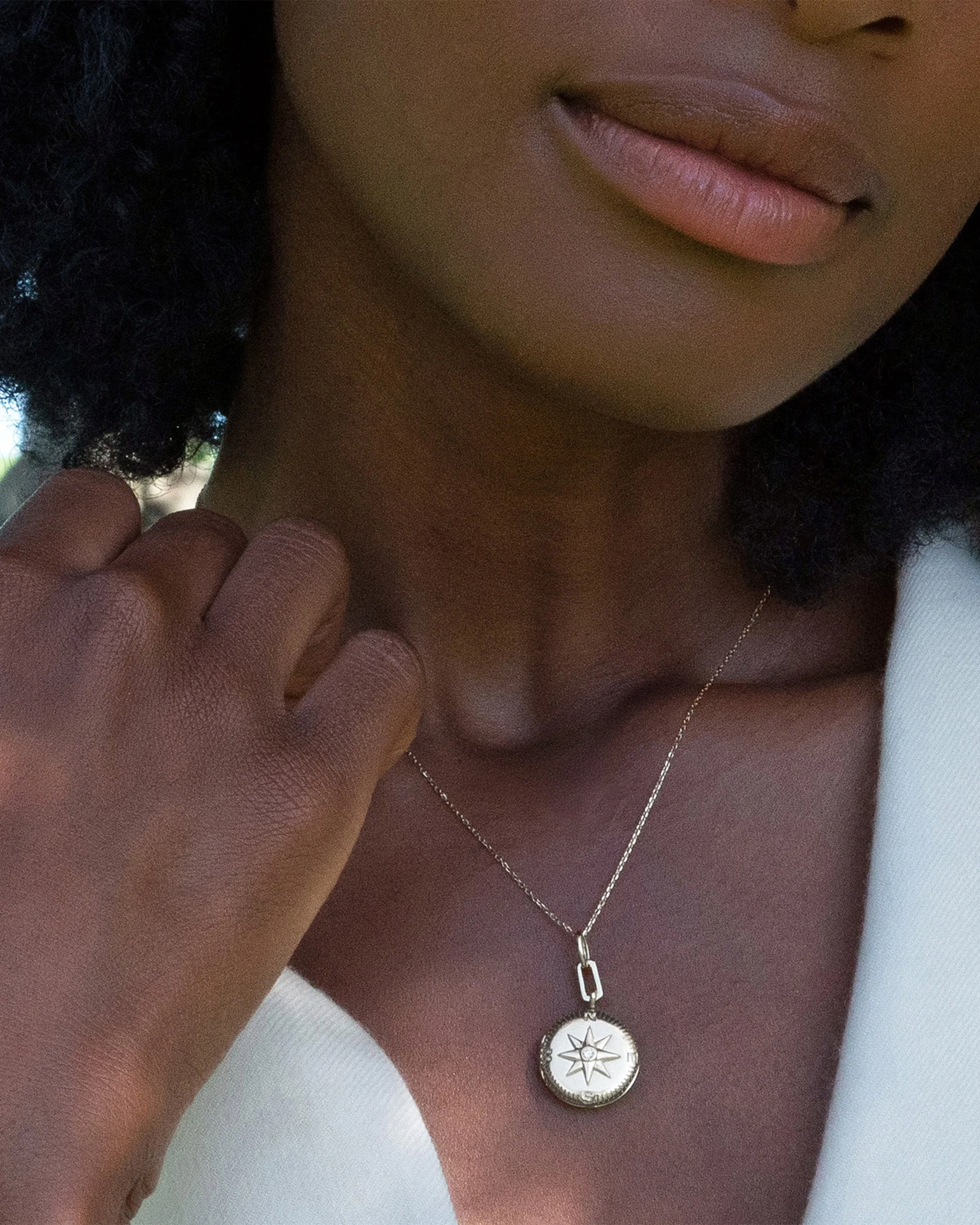 Monica Rich Kosann Adventure compass locket on a delicate chain